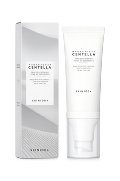 Сонцезахисний крем що освітлює з тоном для обличчя SKIN1004 Madagascar Centella Tone Brightening SPF50 Tone-Up Sunscreen 50 мл 056 фото